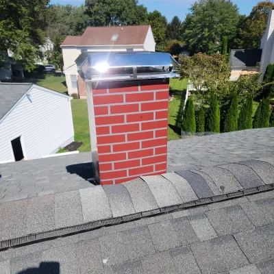chimney-chase-cover-installation-baltimore-md-anointed-chimney-sweeps(1)