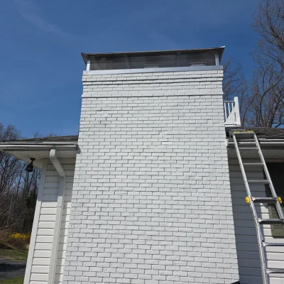 painted-brick-chimney-restoration-custom-cap-baltimore-md